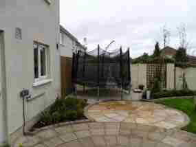 Re positioned trampoline and new kitchen herb beds