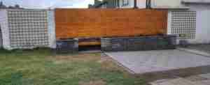 Image of raised bed and timber larch cladding, new silver granite patio